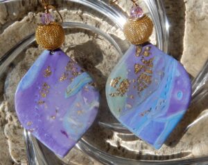 Blue, violet, and gold earrings